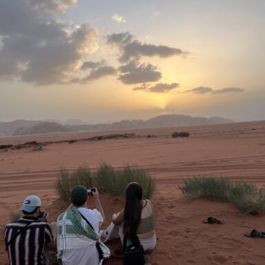 Waiting for sun going down the hills